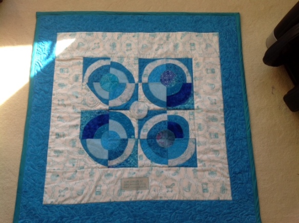 Finished the first of a series of three quilts - this one is named "Surf Circles."
